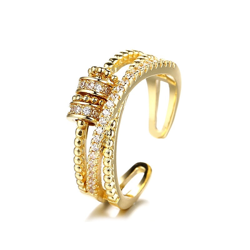 gold fidget ring with zirconia