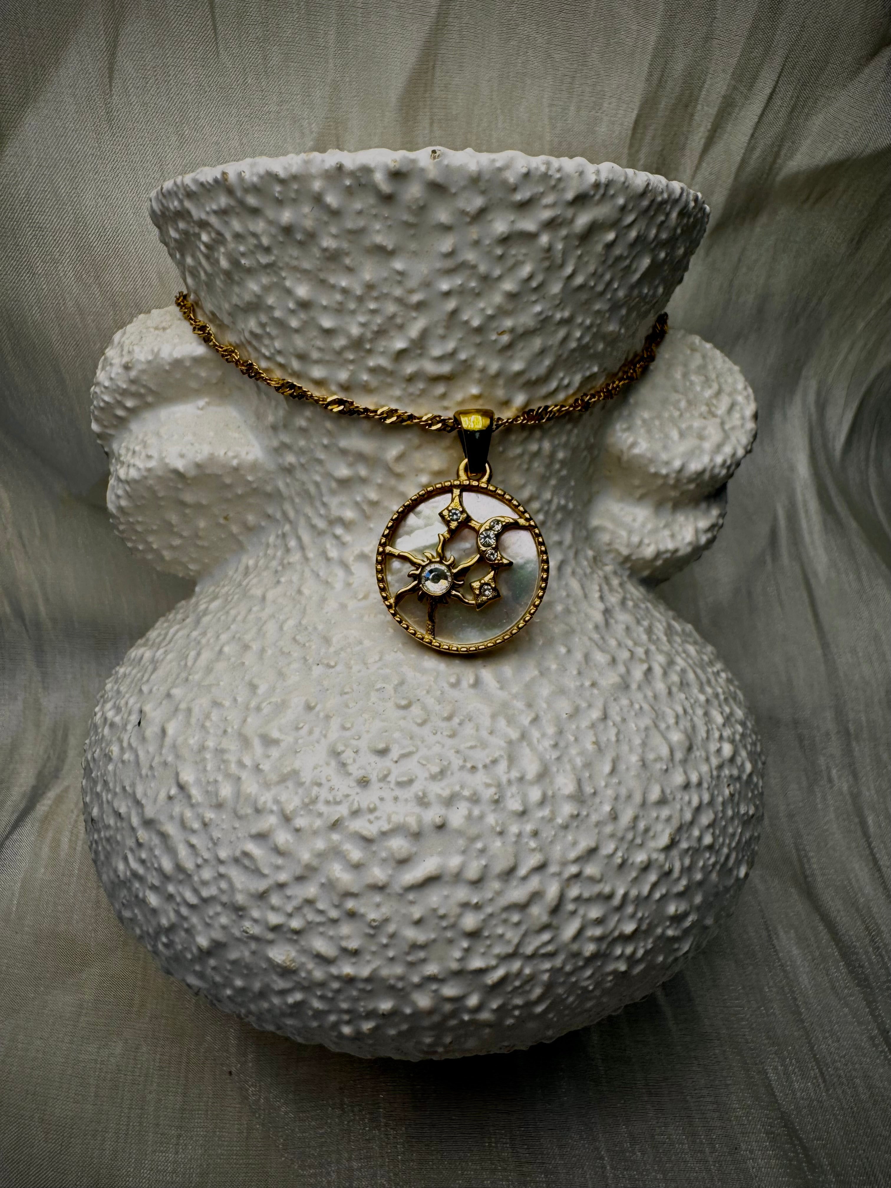 Mother of Pearl Sun, Moon and Stars pendant