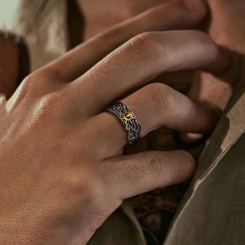 silver sun and lighting ring