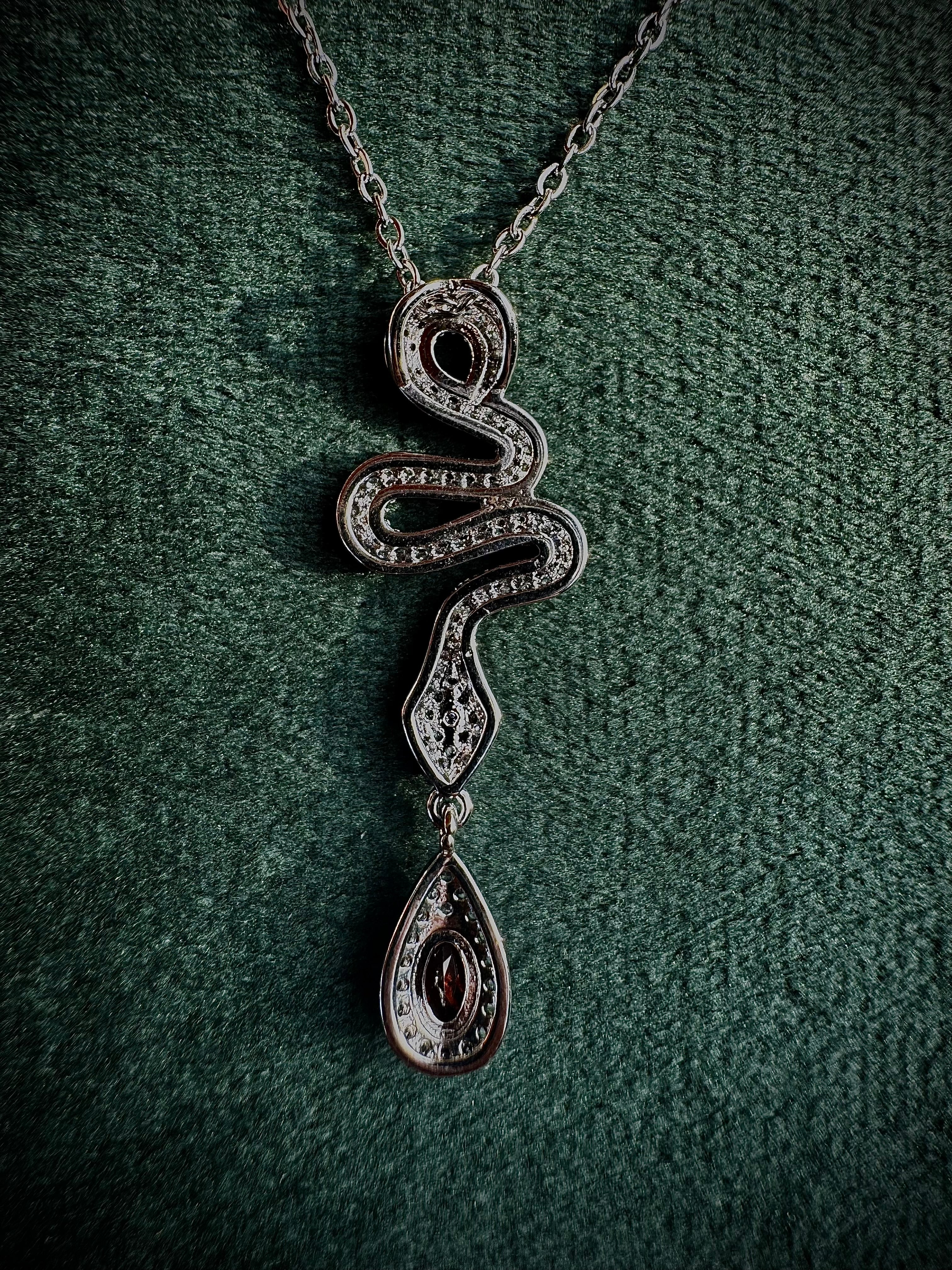 Silver Snake with Garnet Droplet