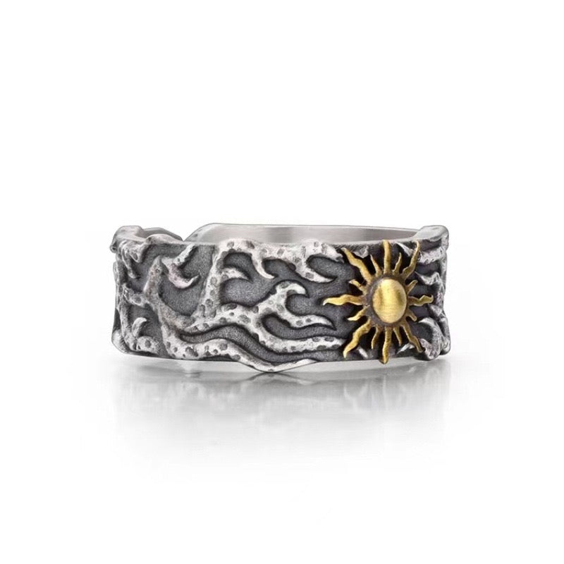 silver sun and lighting ring