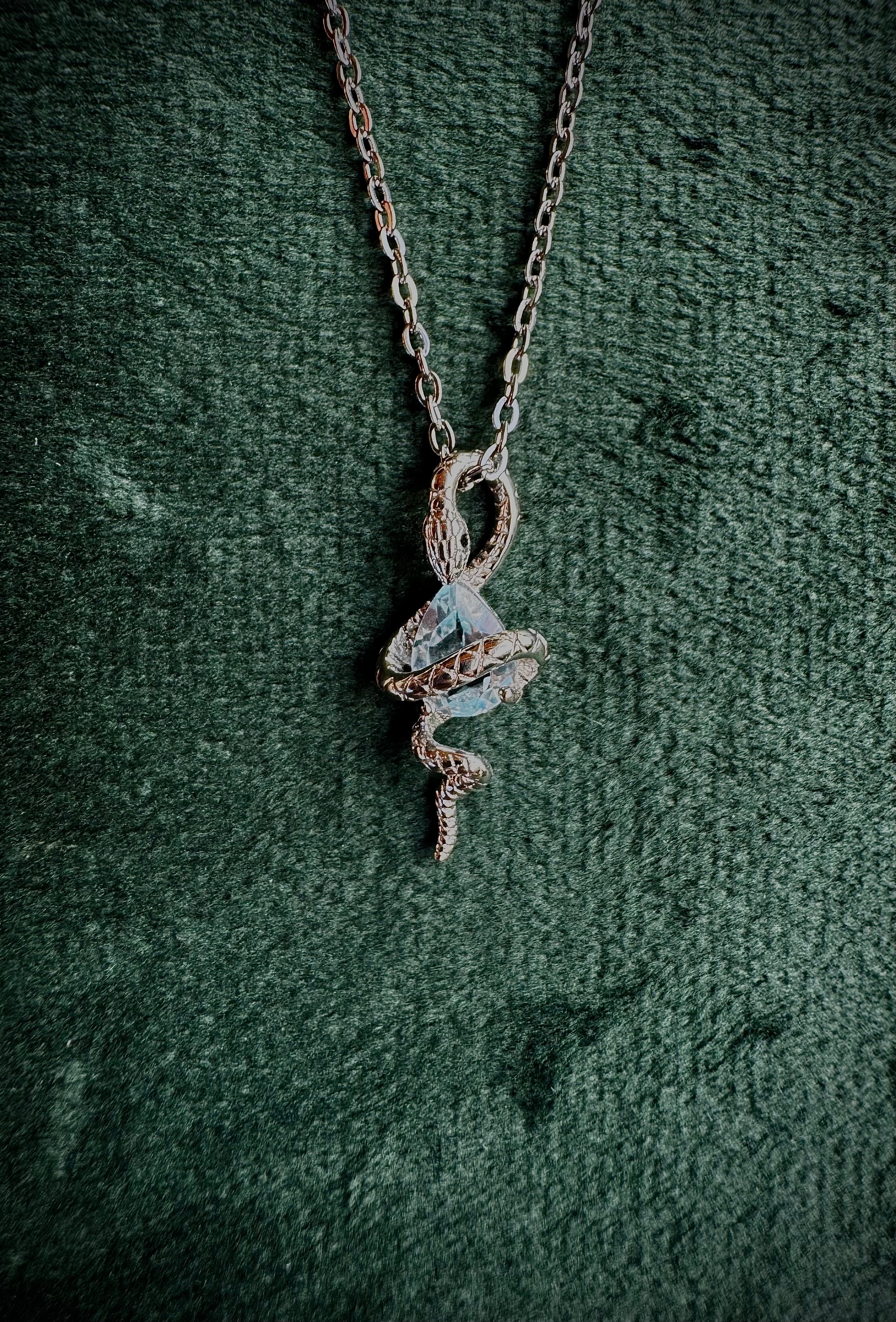 S925 Snake Holding Gem