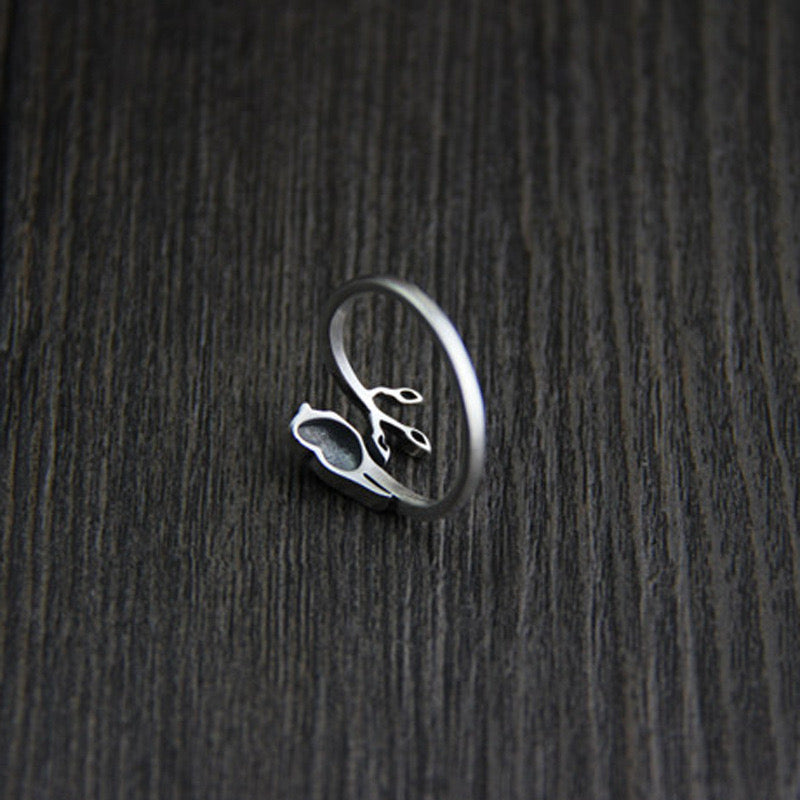 silver adjustable ring with bird design