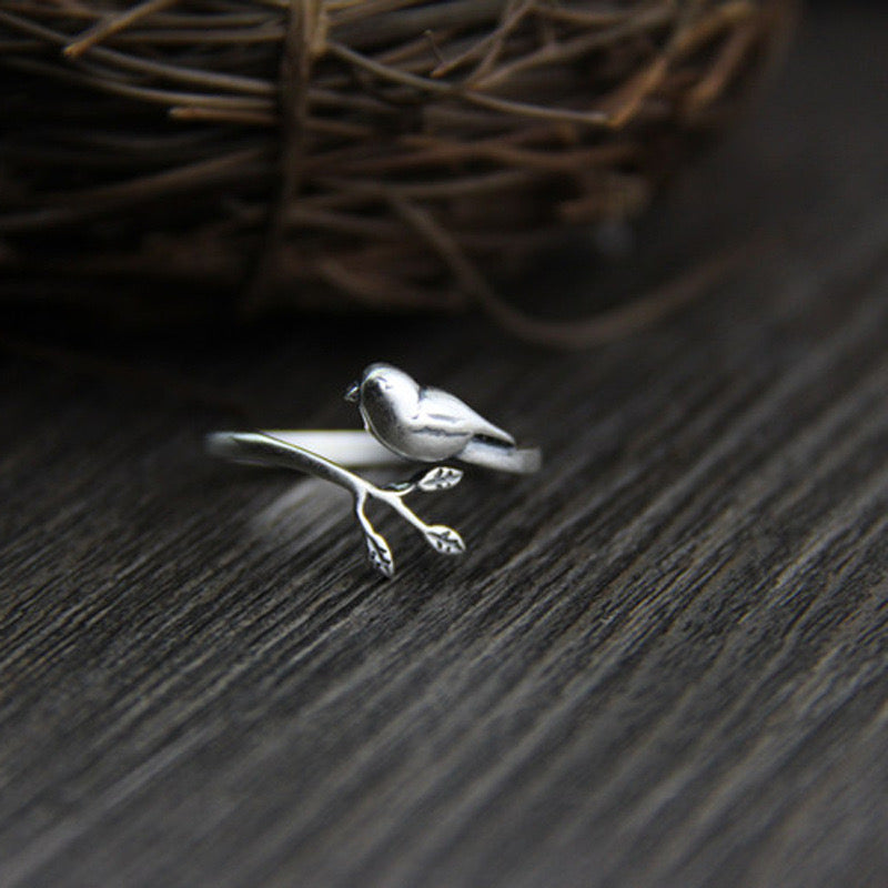 silver adjustable ring with bird design