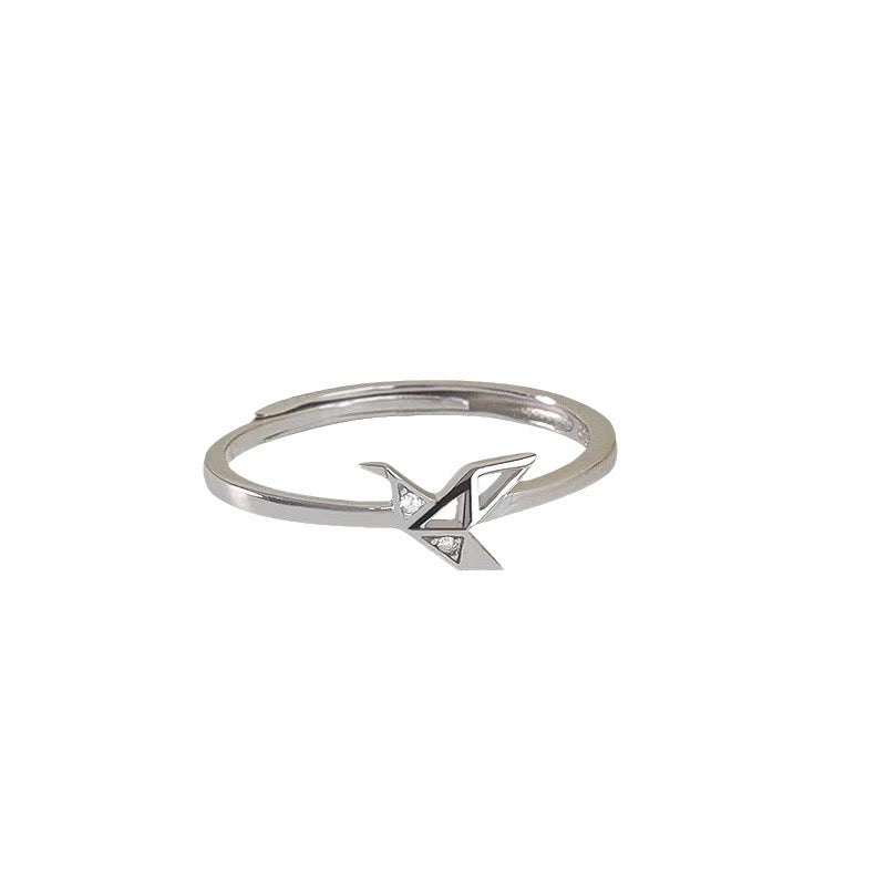 silver ring with crane origami design