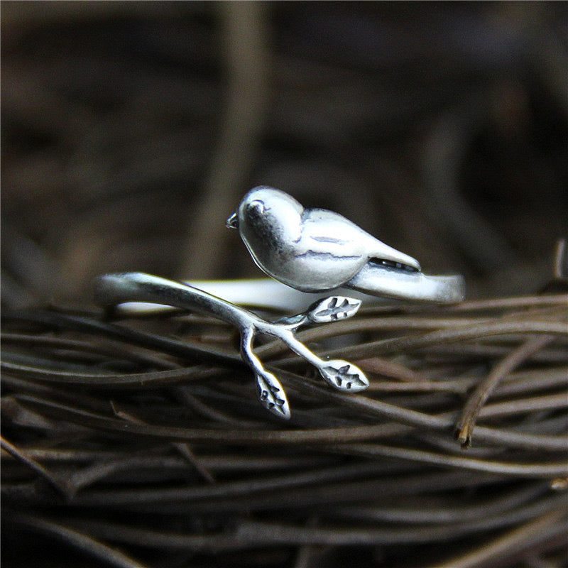 silver adjustable ring with bird design