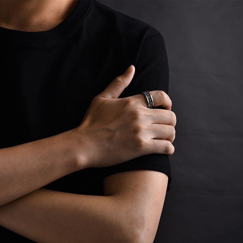 man wearing silver aqua man ring