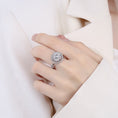 Load image into Gallery viewer, woman wearing silver fidget ring with blue zirconia butterfly design
