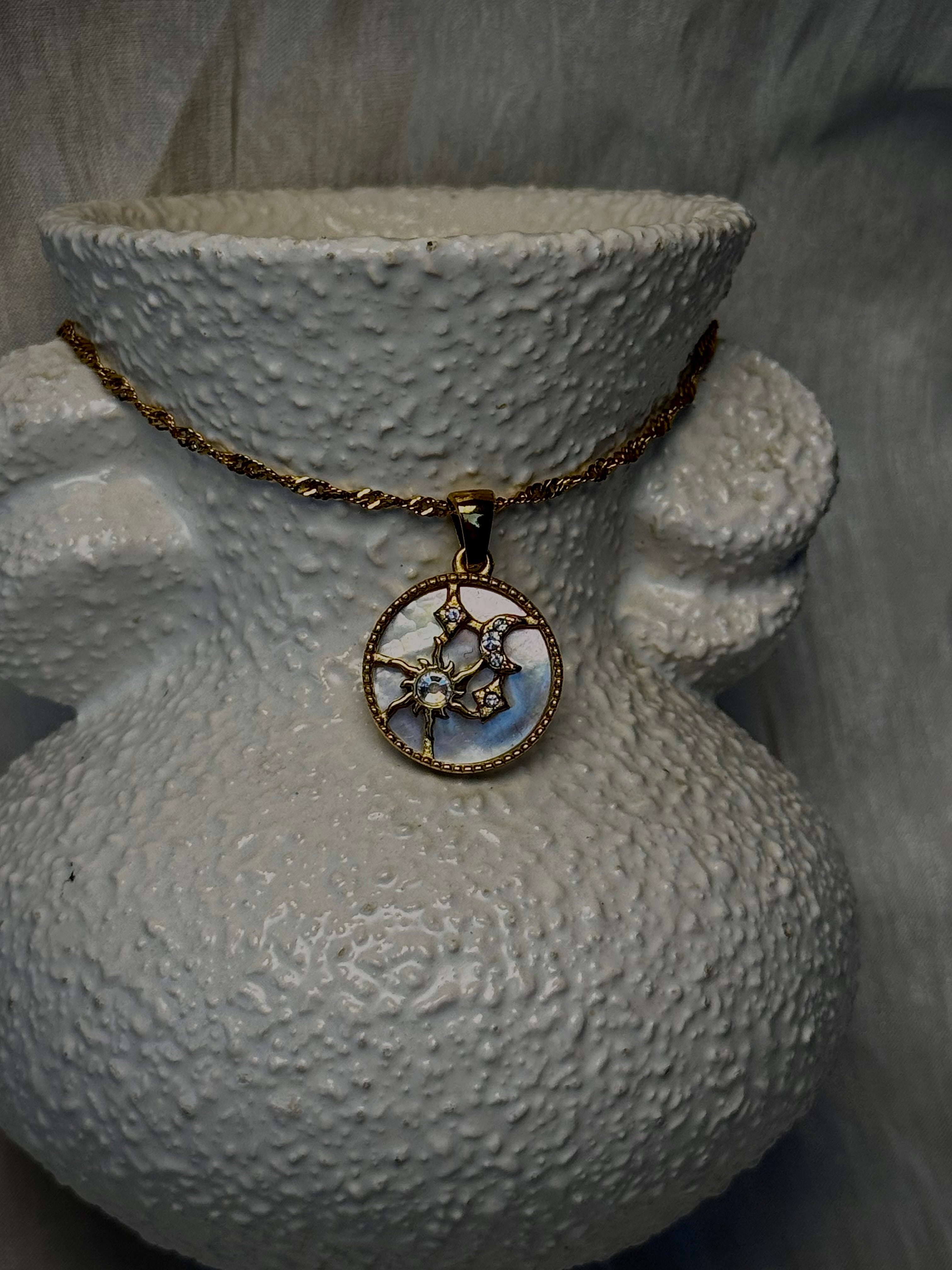Mother of Pearl Sun, Moon and Stars pendant