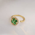 Load image into Gallery viewer, gold plated ring with green 4 leaf clover design
