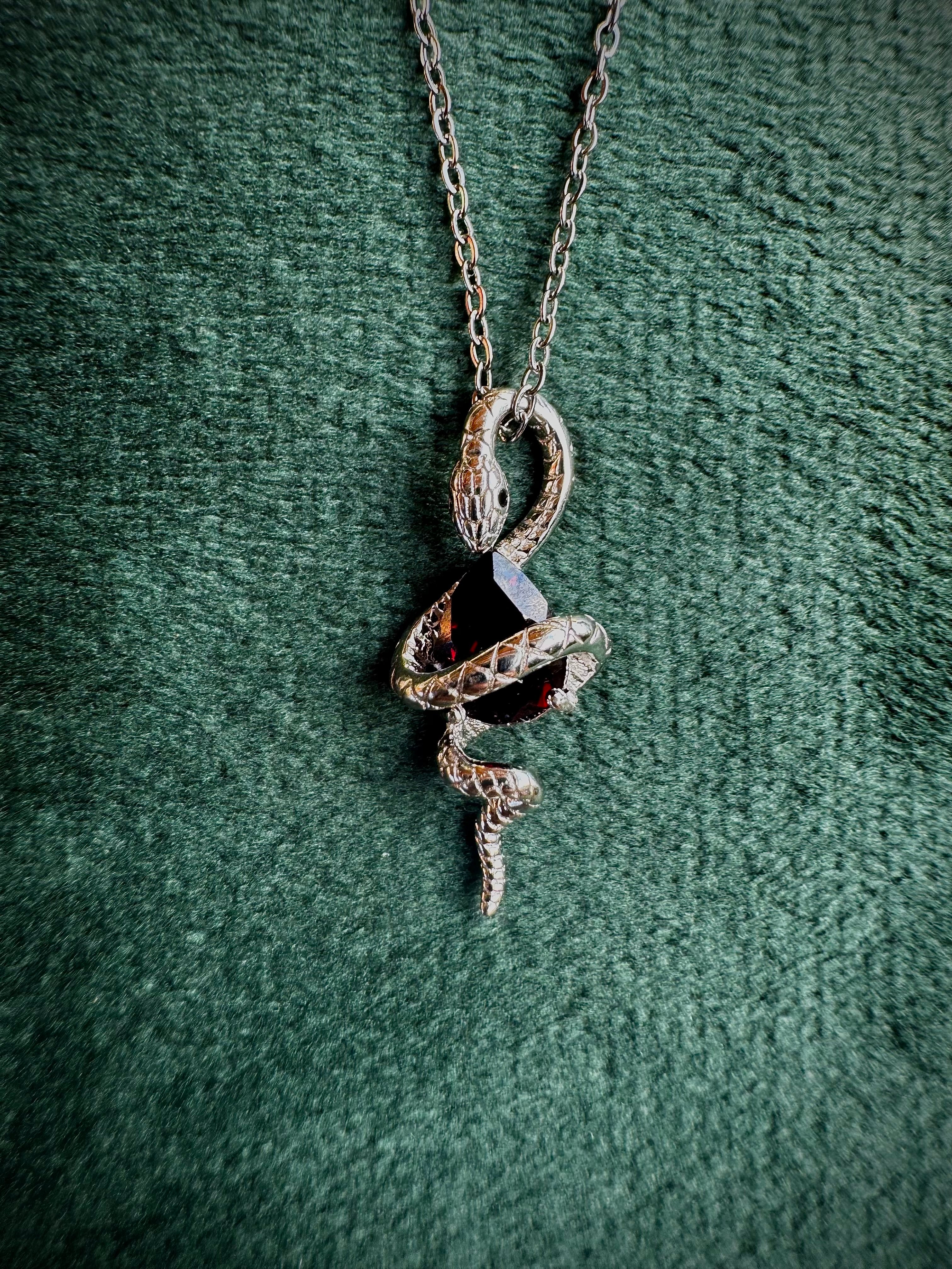 S925 Snake Holding Gem