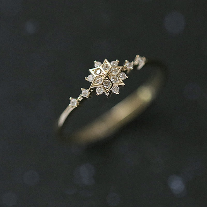 gold plated ring with zircon snowflake design