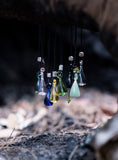 Load image into Gallery viewer, Bowling pin essential oil glass bottle pendant with black necklace
