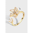 Load image into Gallery viewer, gold fidget ring with zirconia windmill design
