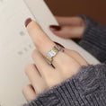 Load image into Gallery viewer, finger with silver tile ring with gold plated details
