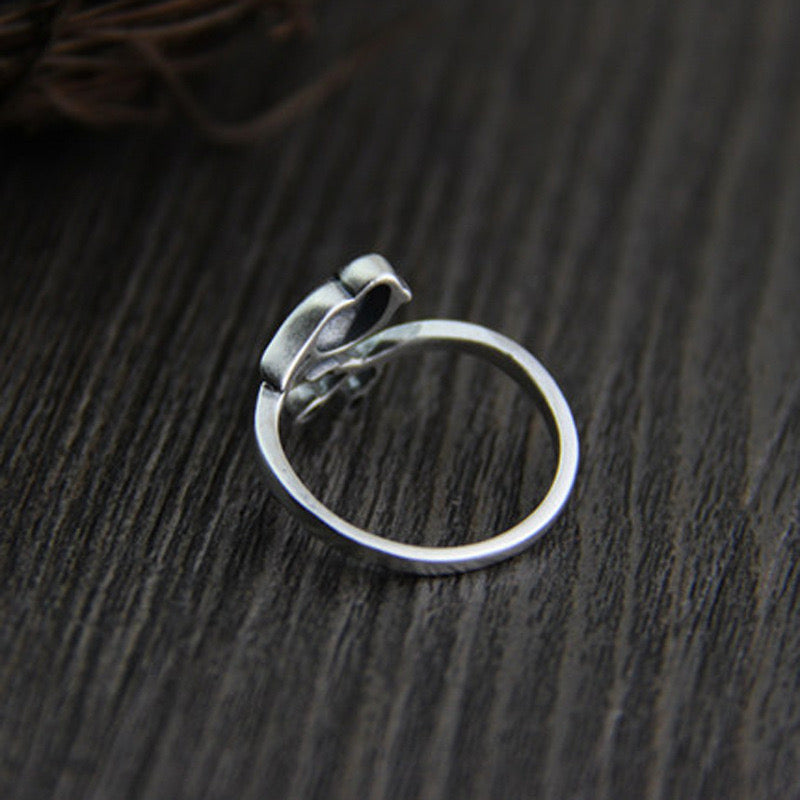 silver adjustable ring with bird design