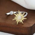 Load image into Gallery viewer, silver fidget ring with gold plated sun design
