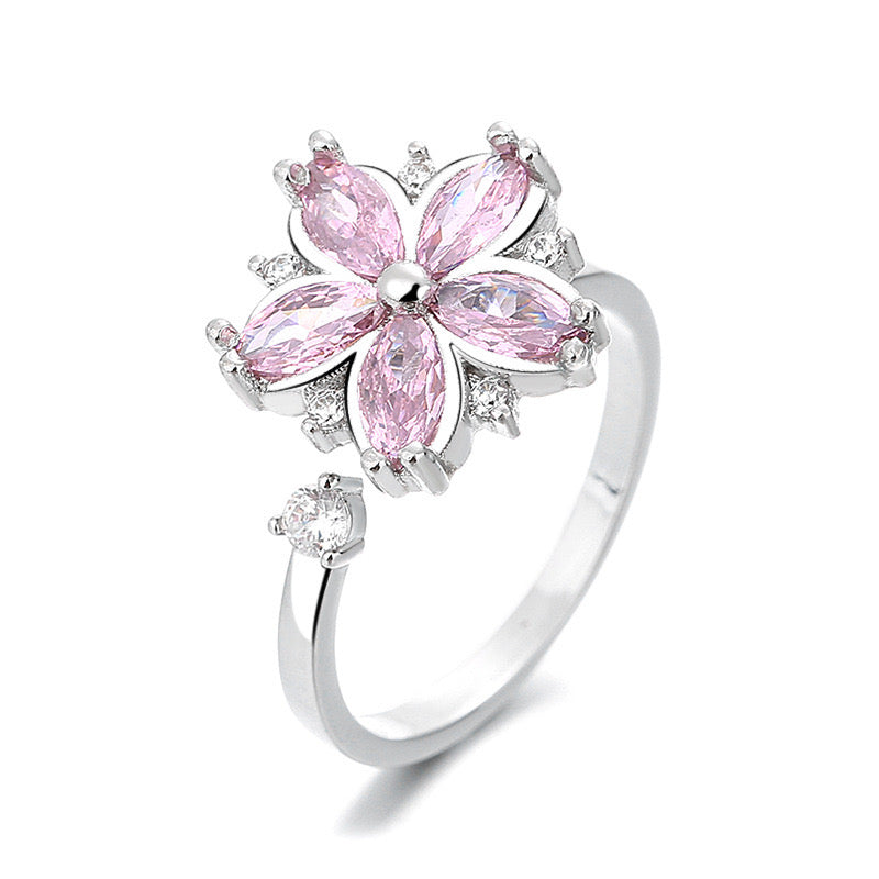 silver ring with pink flower