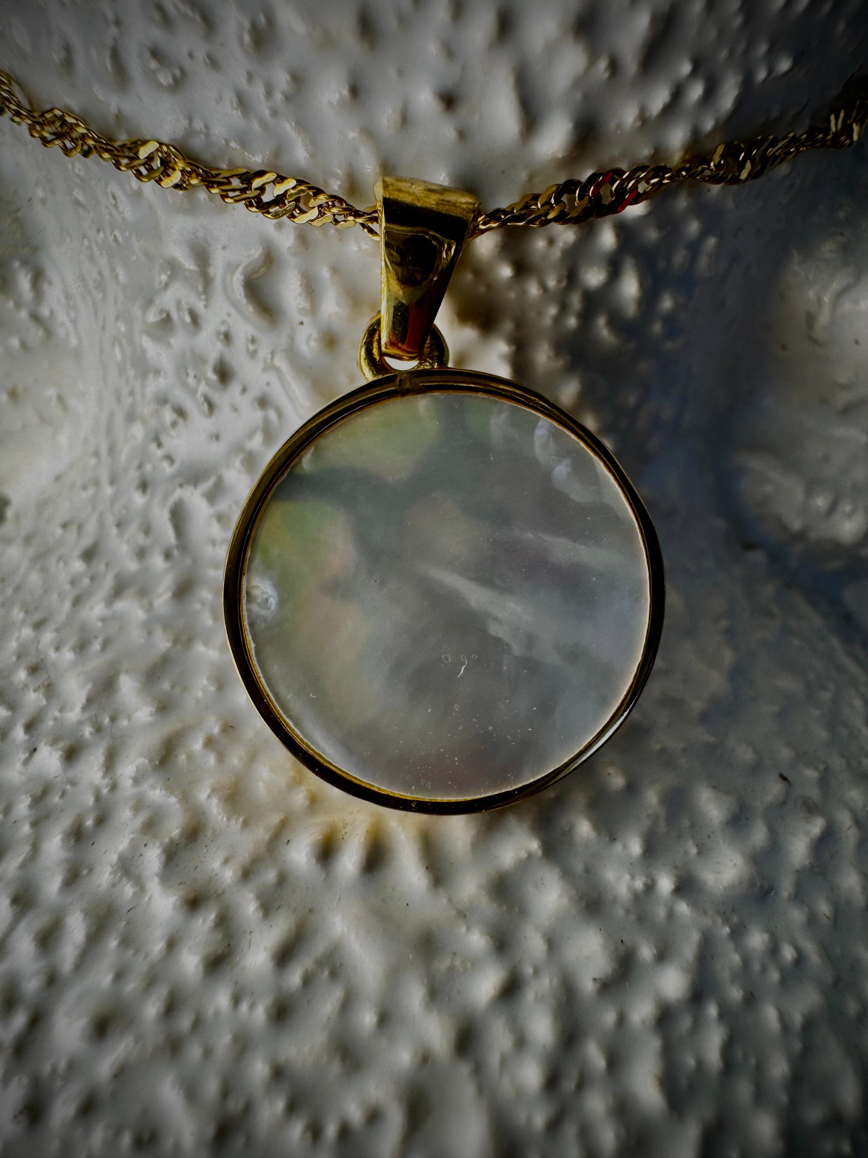 Mother of Pearl Sun, Moon and Stars pendant