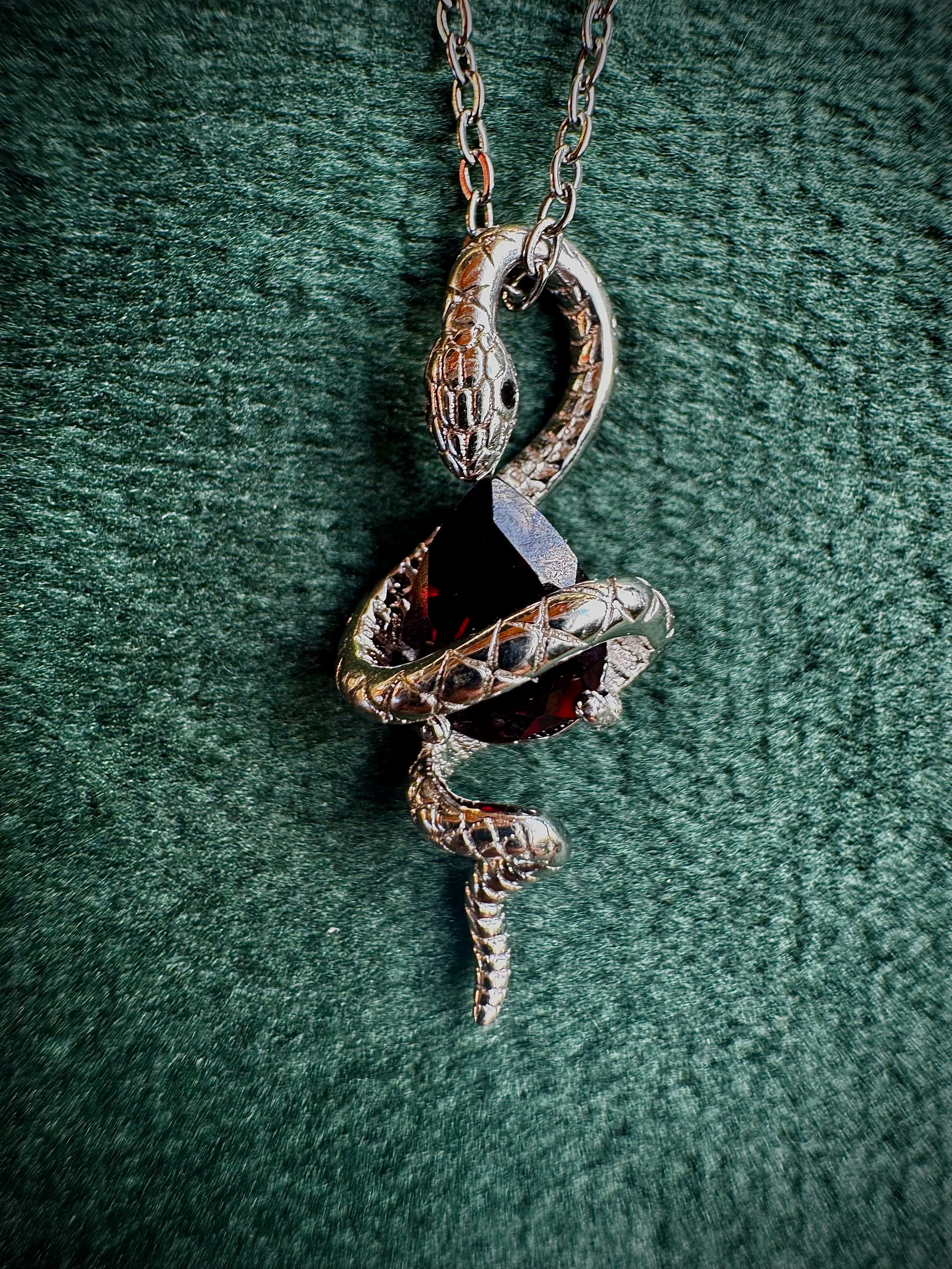 S925 Snake Holding Gem