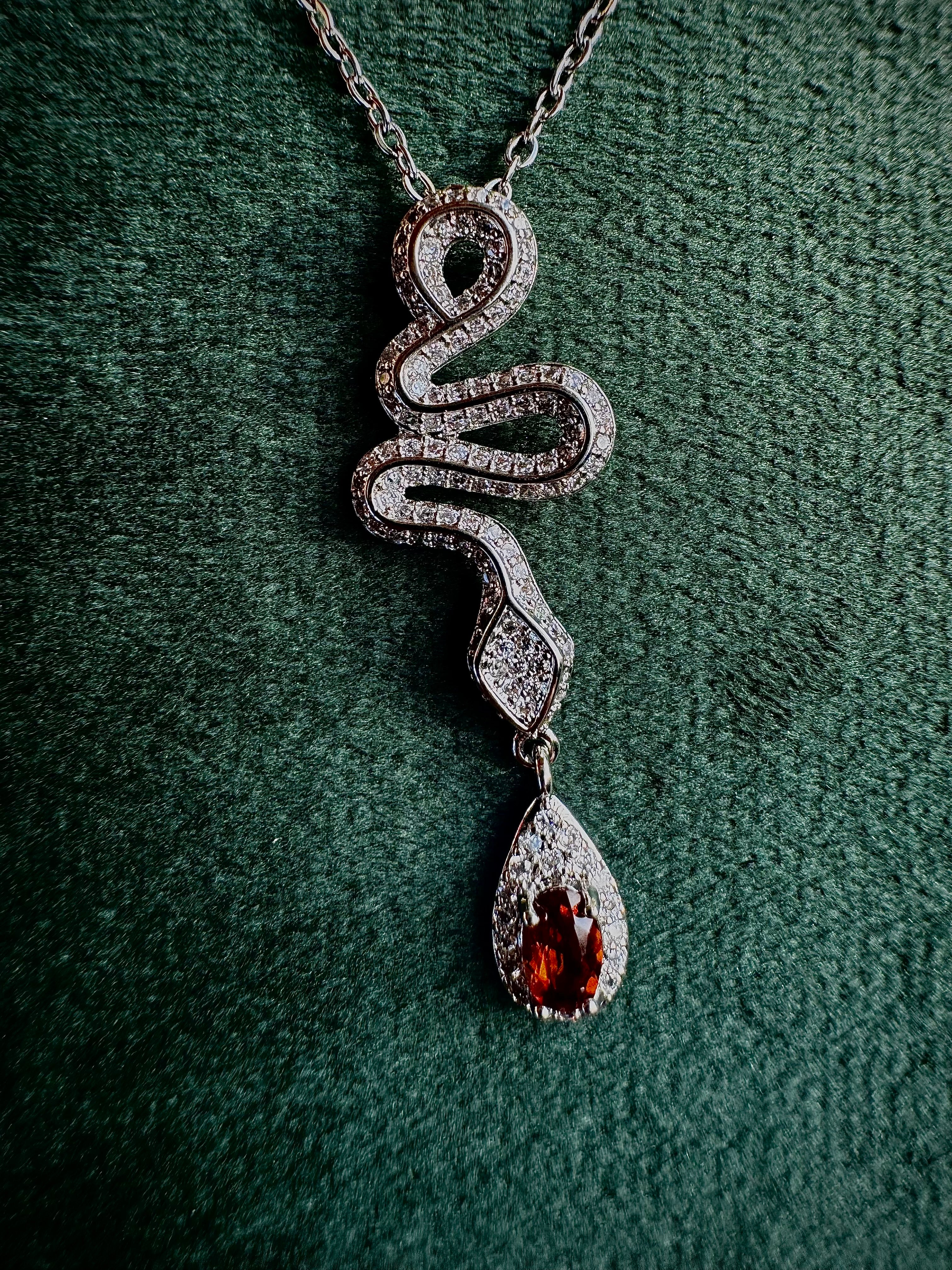 Silver Snake with Garnet Droplet