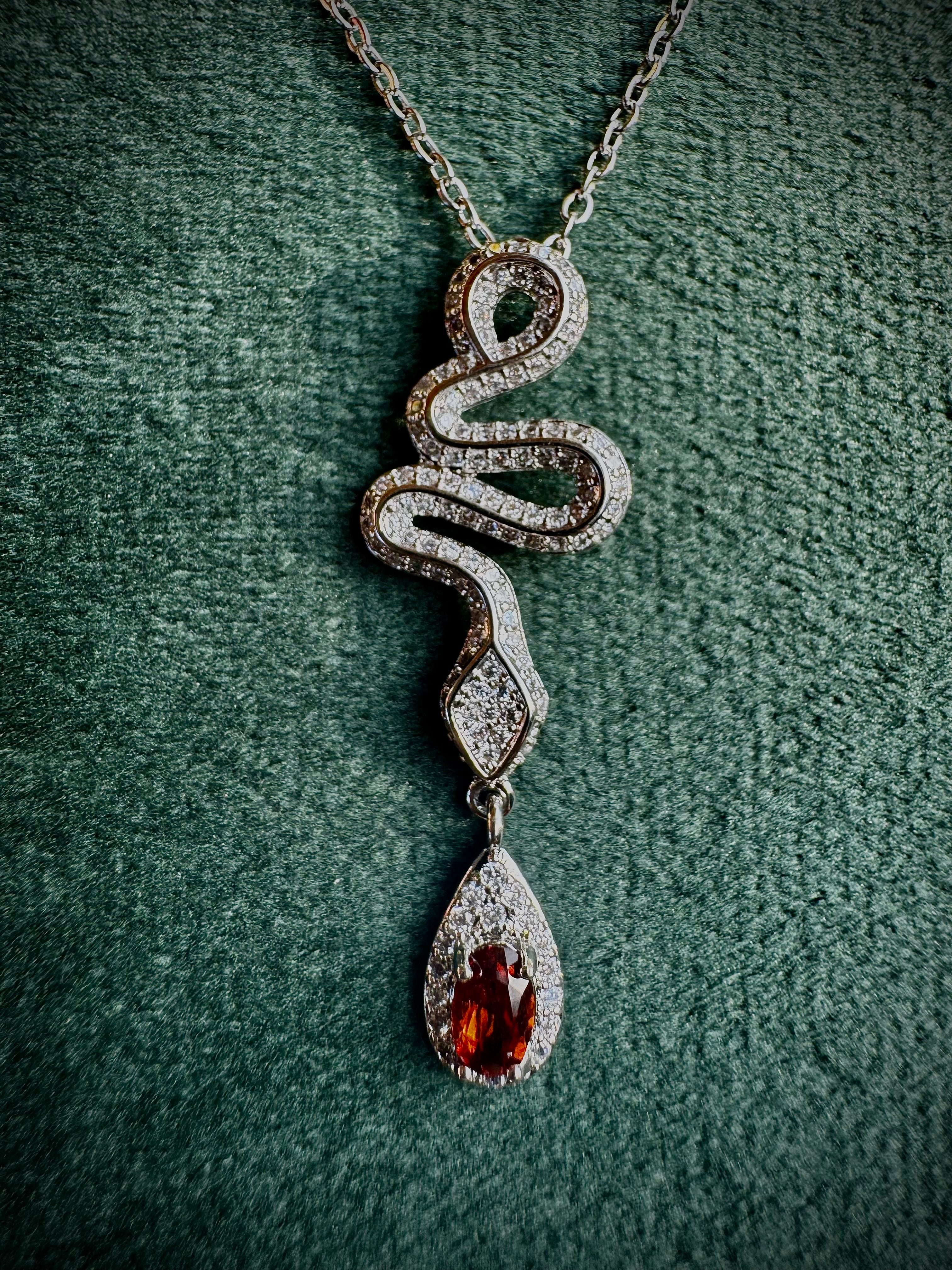 Silver Snake with Garnet Droplet
