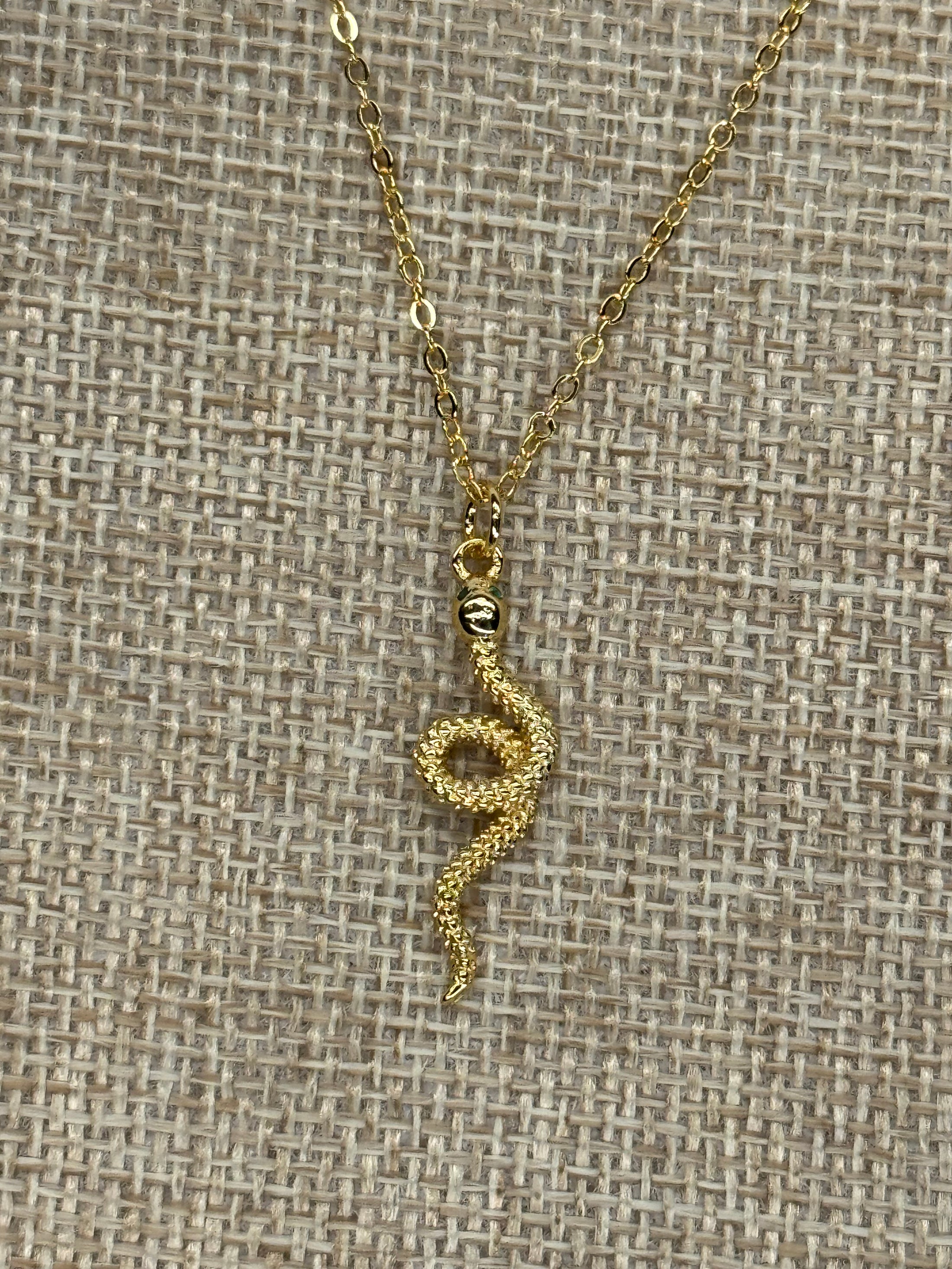 gold plated necklace with snake pendant